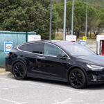 Tesla Model x ev electric car vehicle in charging station super charger