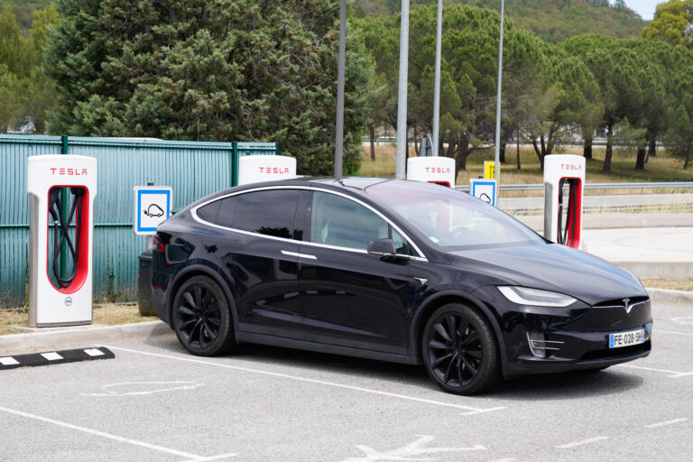 Tesla Model x ev electric car vehicle in charging station super charger